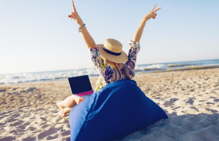 Girl in beach working